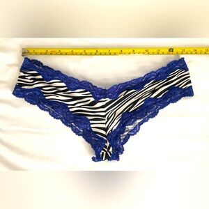 EUC sexy zebra stripped booty shorts, blue lace accents, stretchy.